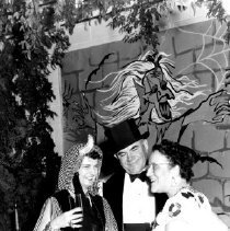 Guests Talking at the Frost Family Halloween Party